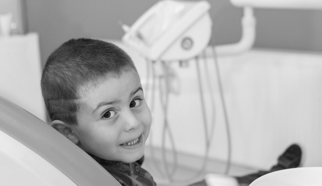 Happy Boy In A Dental Chair